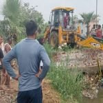 A child is missing after falling into an open drain
